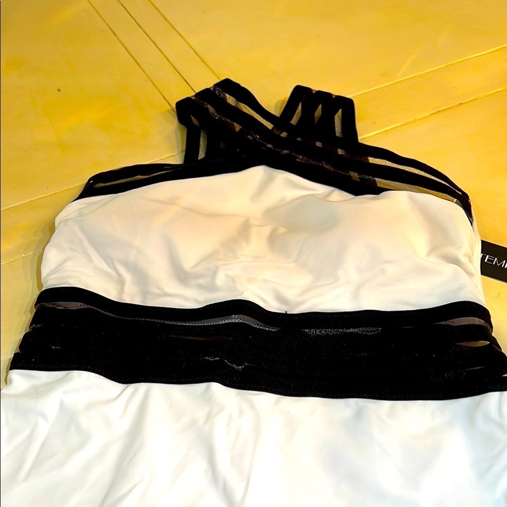 TEMPT ME BATHING SUIT SIZE M  WHITE AND BLACK